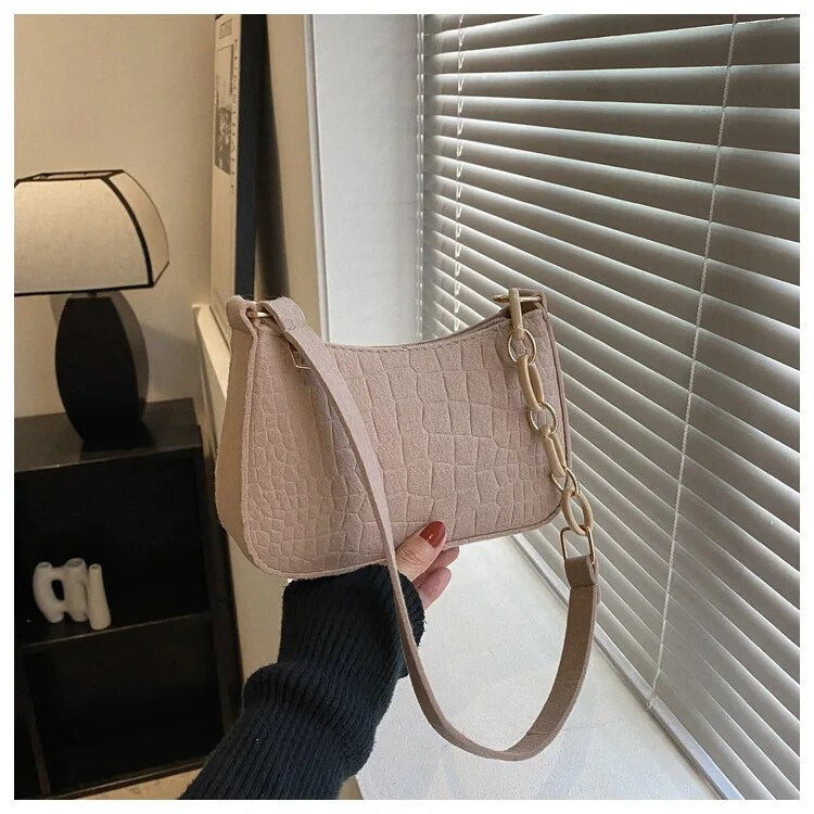 Magnella | Elegant shoulder bag in crocodile-embossed design
